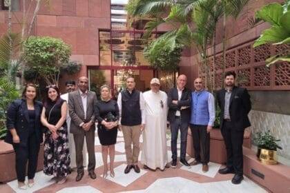 Indian Ambassador poses for a group photo with local media representatives.