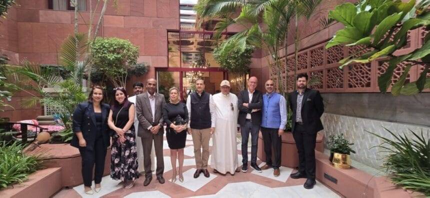 Indian Ambassador poses for a group photo with local media representatives.