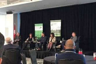 From L to R: Michael Harvey, executive director, Canadian Agri-Food Trade Alliance (CAFTA), Alanna Koch, board chair, Global Institute for Food Security, Scott Ross, executive director, Canadian Federation of Agriculture, Kate Harrison, vice-chair, Summa Strategies Canada, and Mike Wilson, executive director, Smart Prosperity Institute, speak during a panel session at the Canadian Agri-Food Policy Institute’s conference in Ottawa Oct. 2.