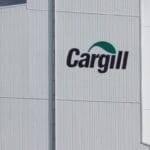 The Cargill logo is displayed on the exterior of a factory in Lucens, Switzerland.