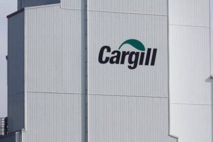 The Cargill logo is displayed on the exterior of a factory in Lucens, Switzerland.
